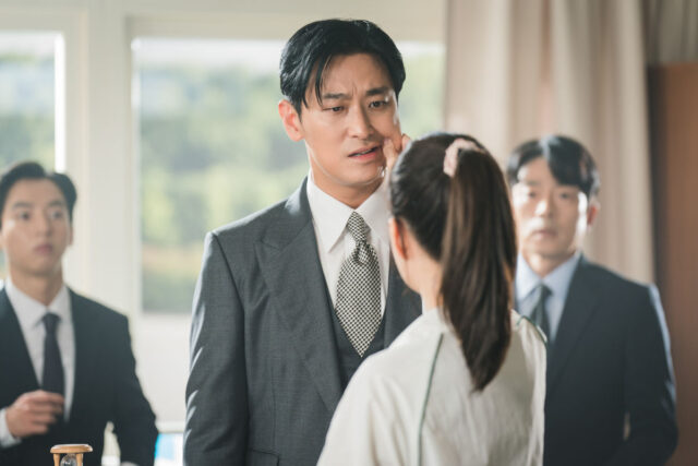 In this scene from "Love Your Enemy," Jung Yu-mi surprises Ju Ji-hoon with a cheek pinch.